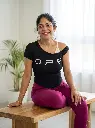 Female_model_sitting_in_outfit_2K_20260924173552.webp