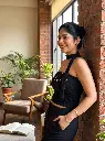 Model_wearing_black_studded_top_2K_20260924183328.webp