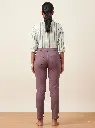 Woman_modeling_pants_in_studio_2K_20260925151104.webp