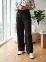 Woman_wearing_pants_in_apartment_2K_20260925153029.webp