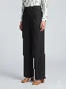 Woman_wearing_pants_standing_2K_20260925153024.webp