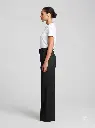 Woman_wearing_pants_in_studio_2K_20260925153021.webp
