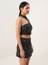 Woman_wearing_charcoal_two-piece…_2K_20260925171931.webp