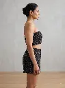 Woman_posing_in_two-piece_set_2K_20260925171522.webp
