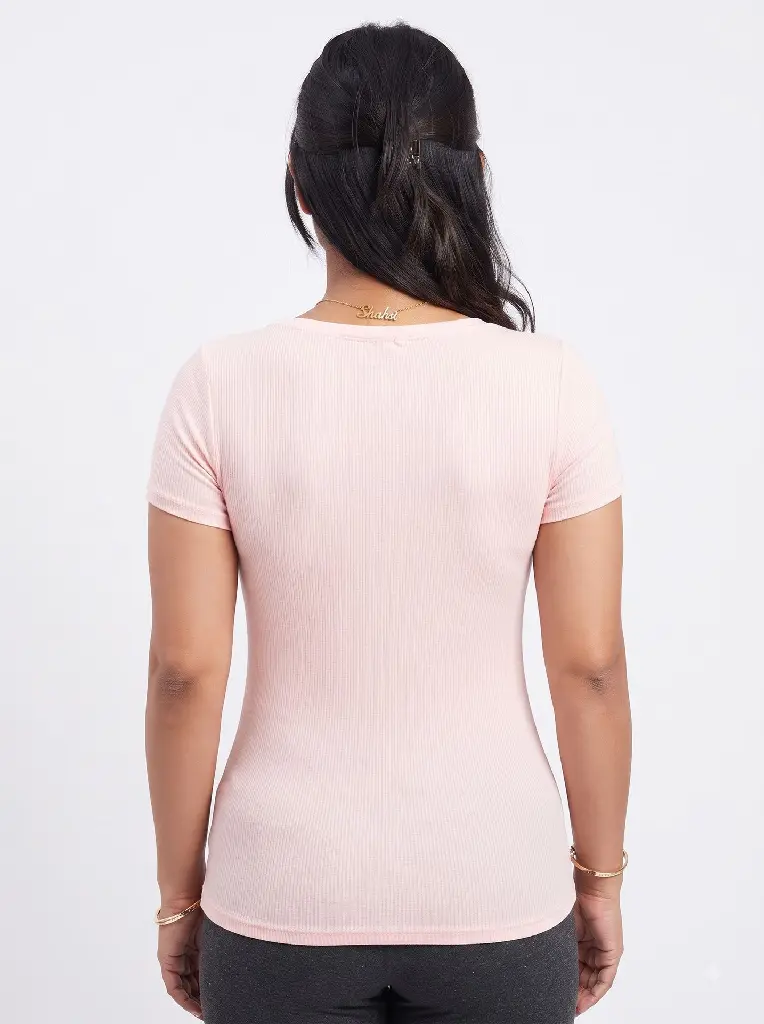 Woman_wearing_top_in_studio_2K_20260925174230.webp