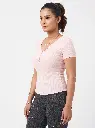 Woman_wearing_top_in_studio_2K_20260925174223.webp