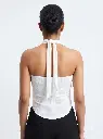 Woman_wearing_top_in_studio_2K_20260925180323.webp