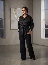 Woman_posing_in_black_top_2K_20260926184407.webp