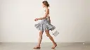 Woman_wearing_light_blue_skirt_2K_20260922182814.webp