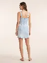 Woman_wearing_denim_dress_2K_20260923131723.webp