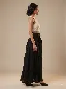 Woman_wearing_black_skirt_2K_20261004025906.webp