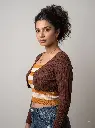 Woman_wearing_brown_ribbed_cardigan_2K_20261004154046.webp