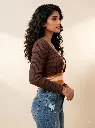 Young_woman_posing_in_sweater_2K_20261004153755.webp